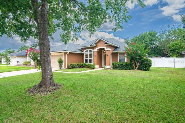 572 Sparrow Branch Cir, Saint Johns, FL 32259 - single story home with an attached garage, stucco siding, roof with shingles, and concrete driveway