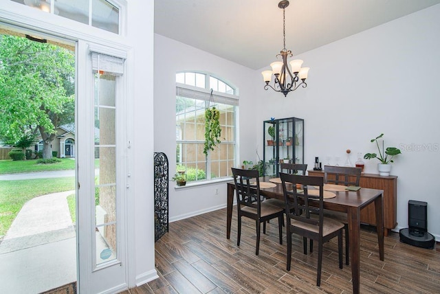 572 Sparrow Branch Cir, Saint Johns, FL 32259 - dining room featuring a chandelier, dark wood-style flooring, and lofted ceiling