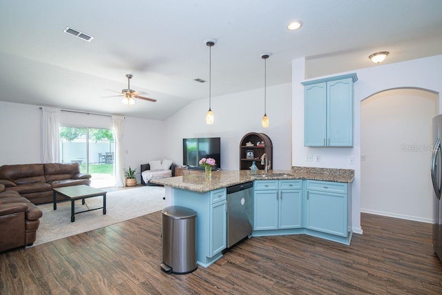 572 Sparrow Branch Cir, Saint Johns, FL 32259 - kitchen featuring dishwasher, open floor plan, arched walkways, dark wood finished floors, and a peninsula