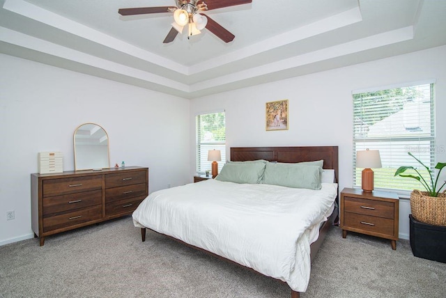 572 Sparrow Branch Cir, Saint Johns, FL 32259 - bedroom featuring a tray ceiling, light colored carpet, and ceiling fan