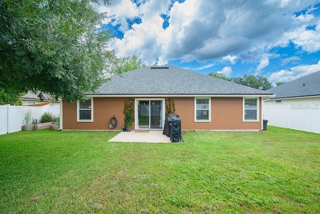 572 Sparrow Branch Cir, Saint Johns, FL 32259 - back of house featuring a fenced backyard, a patio, and roof with shingles