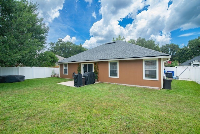 572 Sparrow Branch Cir, Saint Johns, FL 32259 - back of property with a fenced backyard, roof with shingles, and a gate