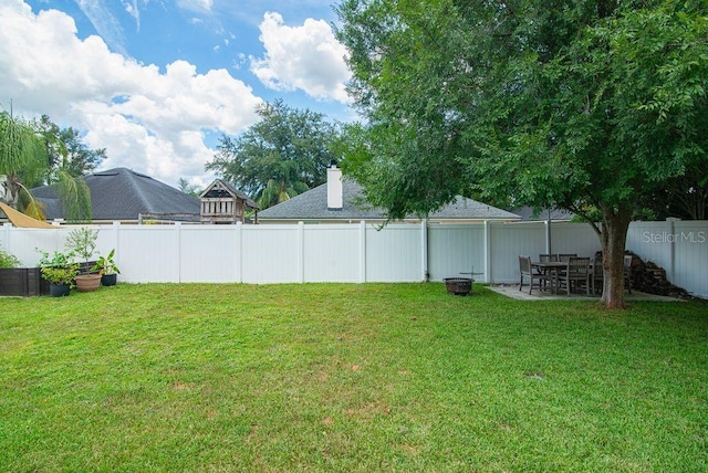 572 Sparrow Branch Cir, Saint Johns, FL 32259 - fenced backyard with a patio area