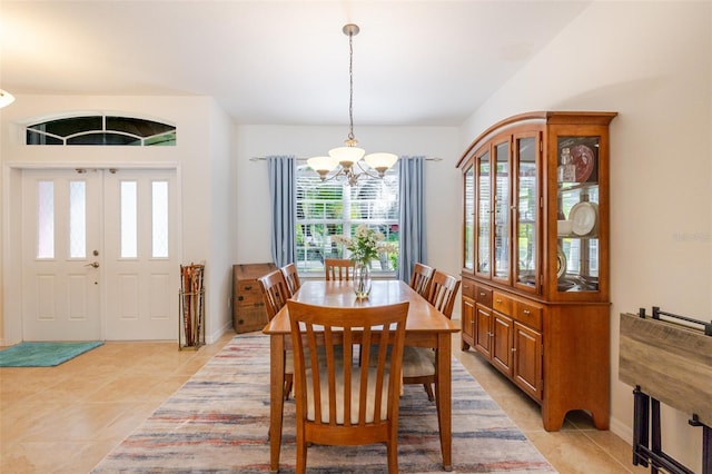 5242 Abdella Ln, North Port, FL 34291 - dining room with a chandelier and light tile patterned flooring