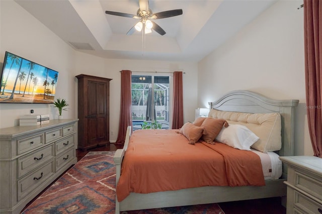 5242 Abdella Ln, North Port, FL 34291 - bedroom with access to outside, a raised ceiling, and ceiling fan