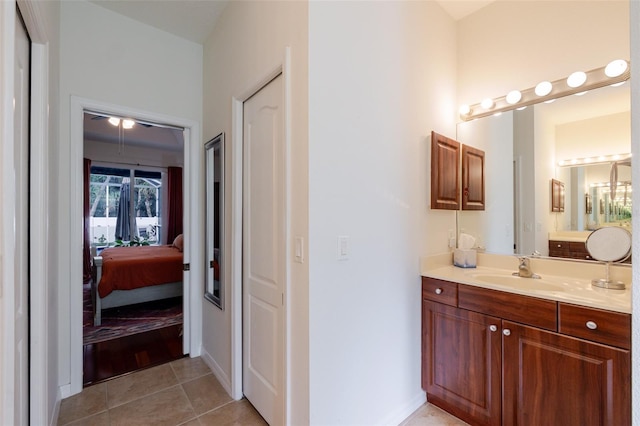 5242 Abdella Ln, North Port, FL 34291 - bathroom featuring connected bathroom, vanity, and tile patterned floors