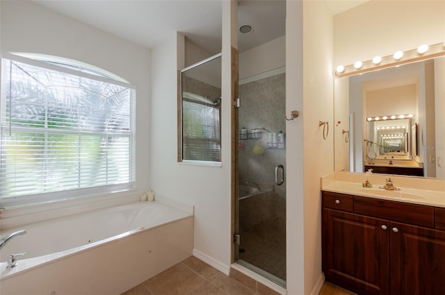 5242 Abdella Ln, North Port, FL 34291 - bathroom with a garden tub, vanity, plenty of natural light, and a stall shower