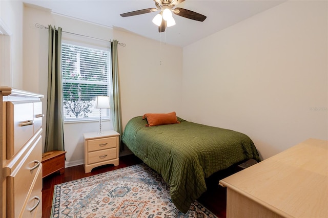 5242 Abdella Ln, North Port, FL 34291 - bedroom featuring dark wood-style floors and ceiling fan