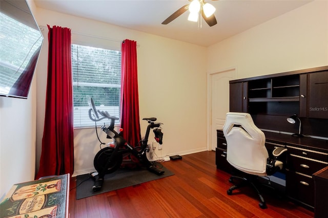 5242 Abdella Ln, North Port, FL 34291 - home office with dark wood-style floors and ceiling fan