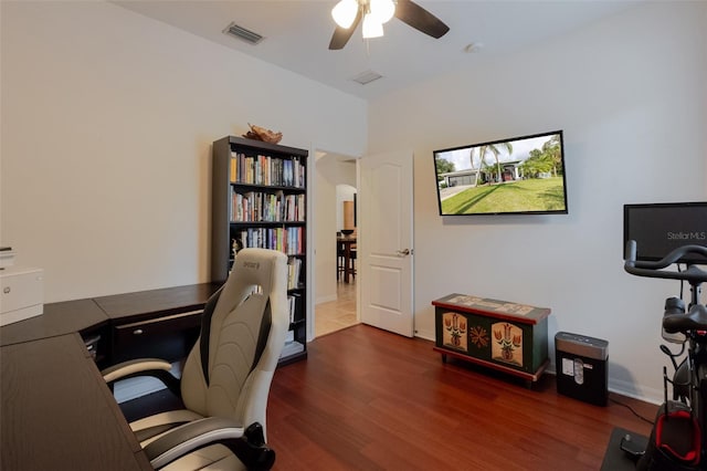 5242 Abdella Ln, North Port, FL 34291 - office area with a ceiling fan, wood finished floors, and arched walkways