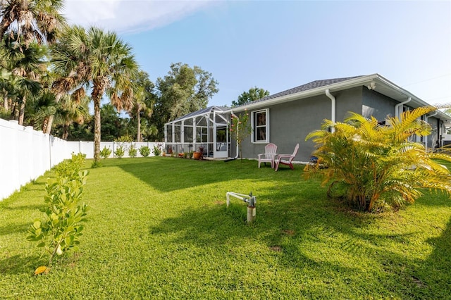 5242 Abdella Ln, North Port, FL 34291 - fenced backyard featuring glass enclosure
