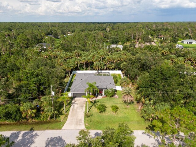 5242 Abdella Ln, North Port, FL 34291 - view from above of property with a forest