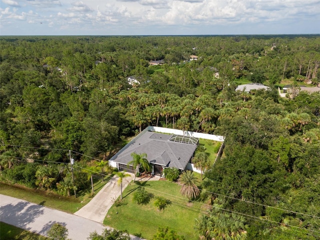 5242 Abdella Ln, North Port, FL 34291 - aerial view of property and surrounding area featuring a heavily wooded area