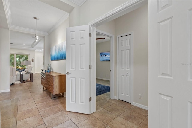 12215 Goldenrod Ave, Bradenton, FL 34212 - hall featuring crown molding and light tile patterned floors