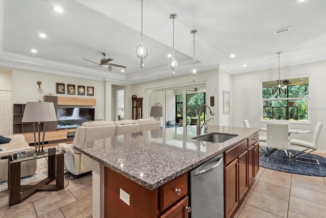 12215 Goldenrod Ave, Bradenton, FL 34212 - kitchen featuring a ceiling fan, plenty of natural light, stainless steel dishwasher, a raised ceiling, and recessed lighting