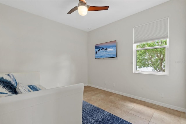 12215 Goldenrod Ave, Bradenton, FL 34212 - unfurnished bedroom with light tile patterned floors and ceiling fan