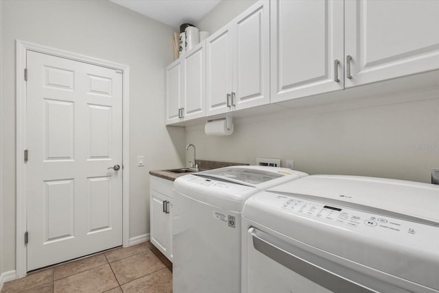 12215 Goldenrod Ave, Bradenton, FL 34212 - laundry room with separate washer and dryer, light tile patterned flooring, and cabinet space