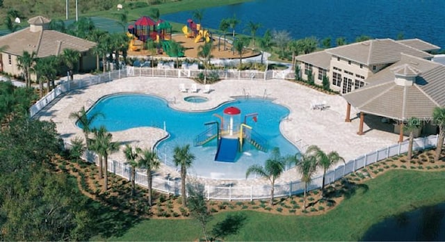 12215 Goldenrod Ave, Bradenton, FL 34212 - community pool with a patio and a jacuzzi