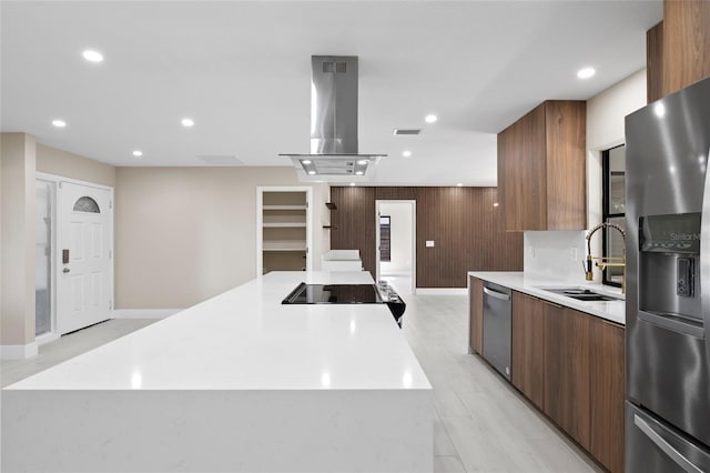 3136 Webber St, Sarasota, FL 34239 - kitchen featuring stainless steel appliances, modern cabinets, island exhaust hood, recessed lighting, and light countertops