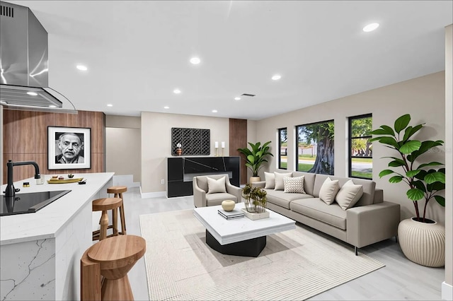 3136 Webber St, Sarasota, FL 34239 - living area with recessed lighting and light wood-style flooring