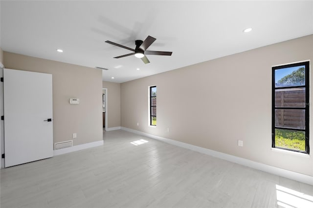 3136 Webber St, Sarasota, FL 34239 - empty room with ceiling fan and recessed lighting