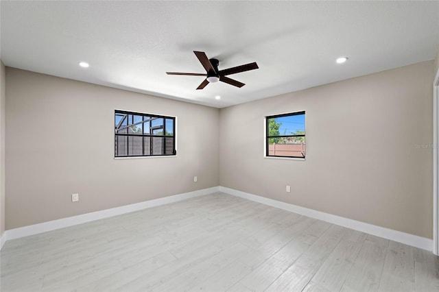 3136 Webber St, Sarasota, FL 34239 - spare room with ceiling fan, light wood-style floors, and recessed lighting