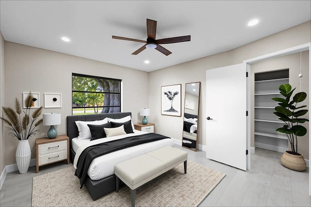 3136 Webber St, Sarasota, FL 34239 - bedroom with a spacious closet, recessed lighting, and ceiling fan