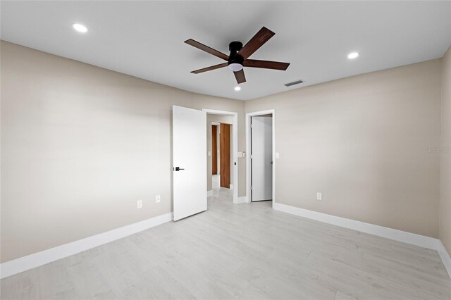 3136 Webber St, Sarasota, FL 34239 - unfurnished bedroom with light wood-style flooring, recessed lighting, and a ceiling fan