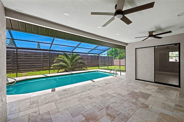 3136 Webber St, Sarasota, FL 34239 - view of swimming pool featuring ceiling fan, a patio, and glass enclosure