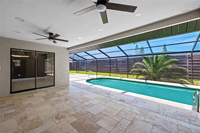 3136 Webber St, Sarasota, FL 34239 - view of swimming pool featuring a ceiling fan, a patio, and glass enclosure