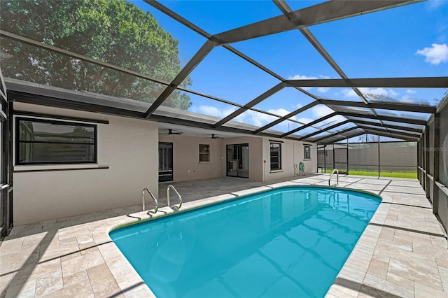3136 Webber St, Sarasota, FL 34239 - outdoor pool with a patio area, a ceiling fan, and glass enclosure