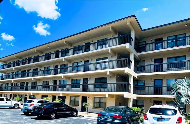 515 30th Ave W Unit H401, Bradenton, FL 34205 - view of apartment building / complex with uncovered parking