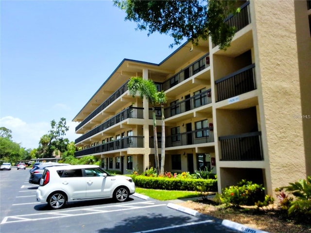 515 30th Ave W Unit H401, Bradenton, FL 34205 - view of apartment building / complex with uncovered parking