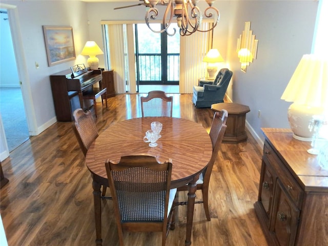 515 30th Ave W Unit H401, Bradenton, FL 34205 - dining space featuring a chandelier and wood finished floors