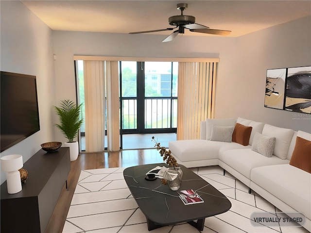 515 30th Ave W Unit H401, Bradenton, FL 34205 - living area with ceiling fan and light wood finished floors