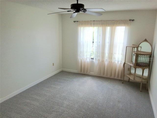 515 30th Ave W Unit H401, Bradenton, FL 34205 - unfurnished room featuring carpet floors, ceiling fan, and a textured ceiling