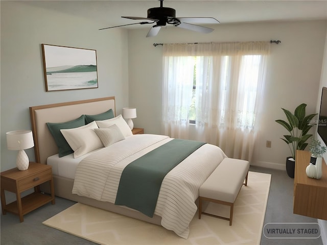 515 30th Ave W Unit H401, Bradenton, FL 34205 - carpeted bedroom featuring a ceiling fan and baseboards