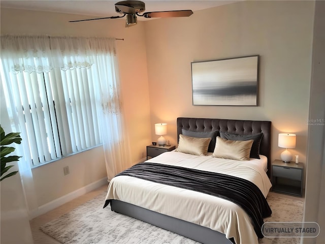 515 30th Ave W Unit H401, Bradenton, FL 34205 - bedroom with baseboards and a ceiling fan