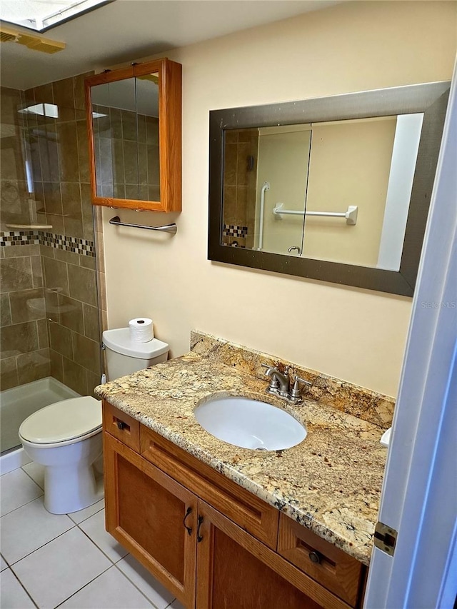 515 30th Ave W Unit H401, Bradenton, FL 34205 - bathroom featuring vanity, a stall shower, and tile patterned flooring