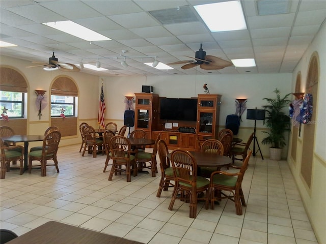 515 30th Ave W Unit H401, Bradenton, FL 34205 - dining space with ceiling fan, light tile patterned floors, and a drop ceiling