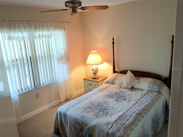515 30th Ave W Unit H401, Bradenton, FL 34205 - bedroom featuring light carpet and a ceiling fan