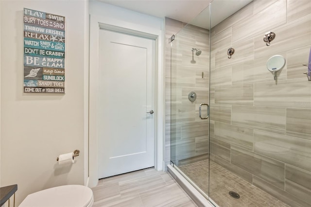 1709 N Tamiami Trl Unit A313, Sarasota, FL 34234 - full bath featuring a stall shower and toilet