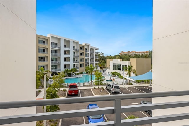 1709 N Tamiami Trl Unit A313, Sarasota, FL 34234 - balcony featuring view of pool area