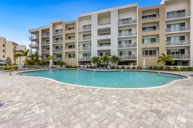 1709 N Tamiami Trl Unit A313, Sarasota, FL 34234 - community pool featuring a patio