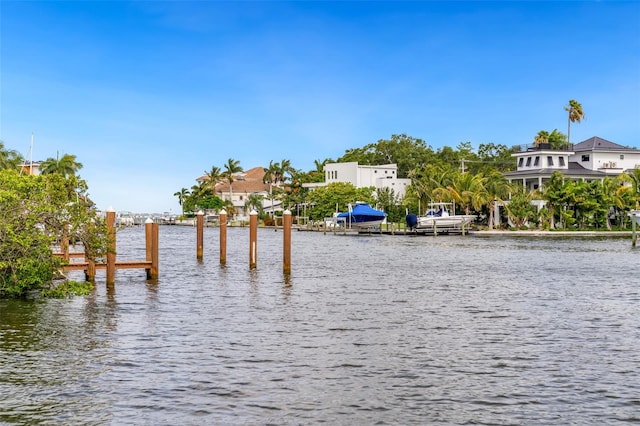 1709 N Tamiami Trl Unit A313, Sarasota, FL 34234 - dock area featuring a water view