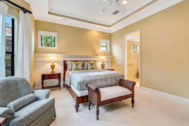7314 Wexford Ct, Lakewood Ranch, FL 34202 - bedroom featuring light carpet, connected bathroom, ornamental molding, a raised ceiling, and recessed lighting