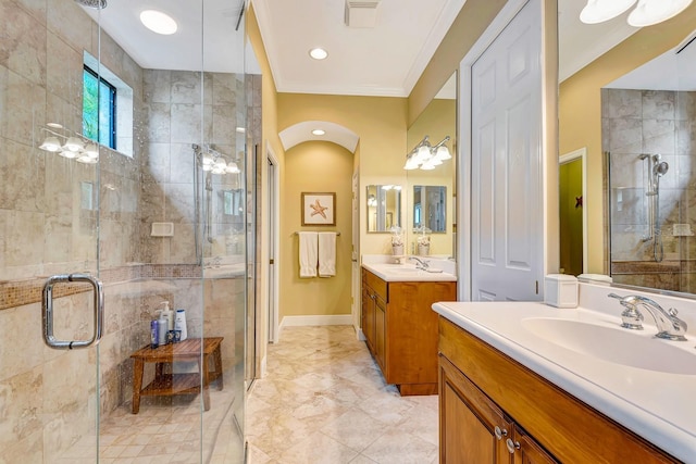 7314 Wexford Ct, Lakewood Ranch, FL 34202 - full bathroom featuring two vanities and a stall shower