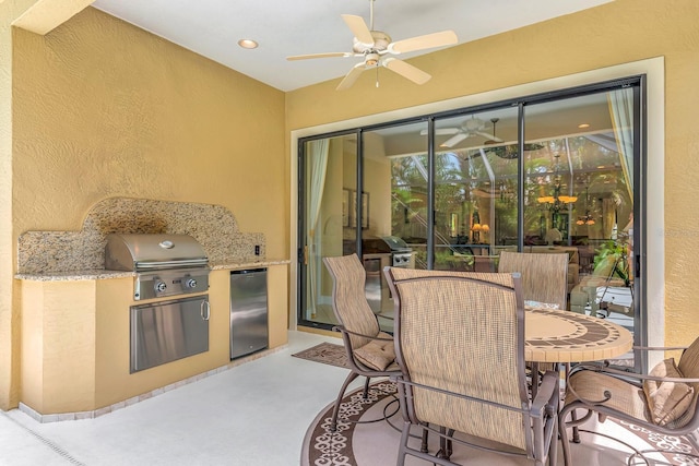 7314 Wexford Ct, Lakewood Ranch, FL 34202 - view of patio / terrace with an outdoor kitchen, a ceiling fan, and outdoor dining space
