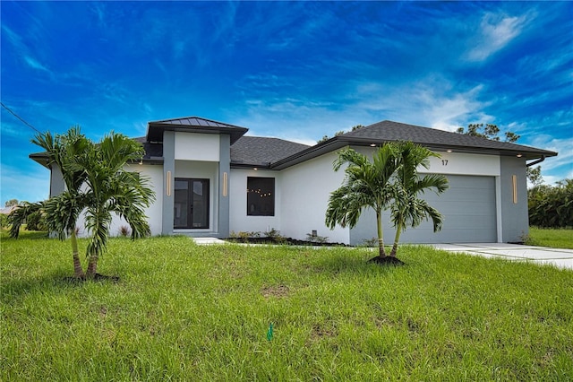 366 Fordham Rd, Venice, FL 34293 - prairie-style home featuring concrete driveway, stucco siding, a garage, and a front lawn