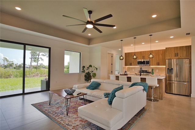 366 Fordham Rd, Venice, FL 34293 - living area featuring ceiling fan, recessed lighting, and a raised ceiling